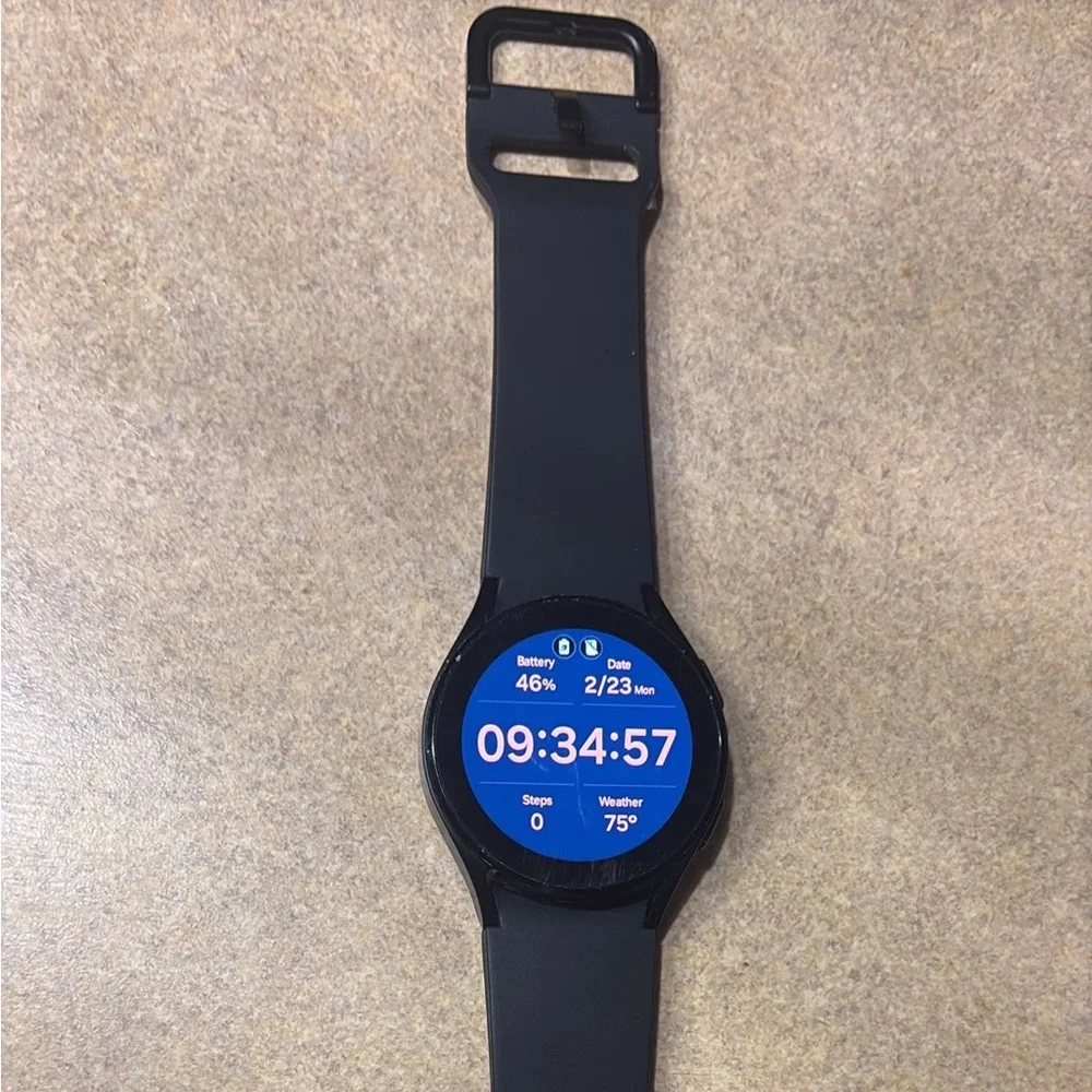 Samsung Black Smartwatch with Blue Watch Face